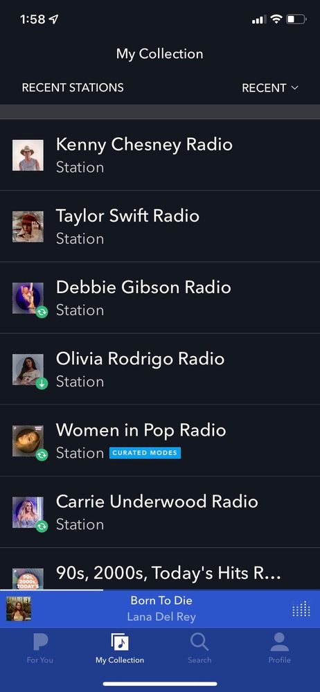 Shuffle view on app; no green shuffle indicator on Taylor Swift or Kenny Chesney stations