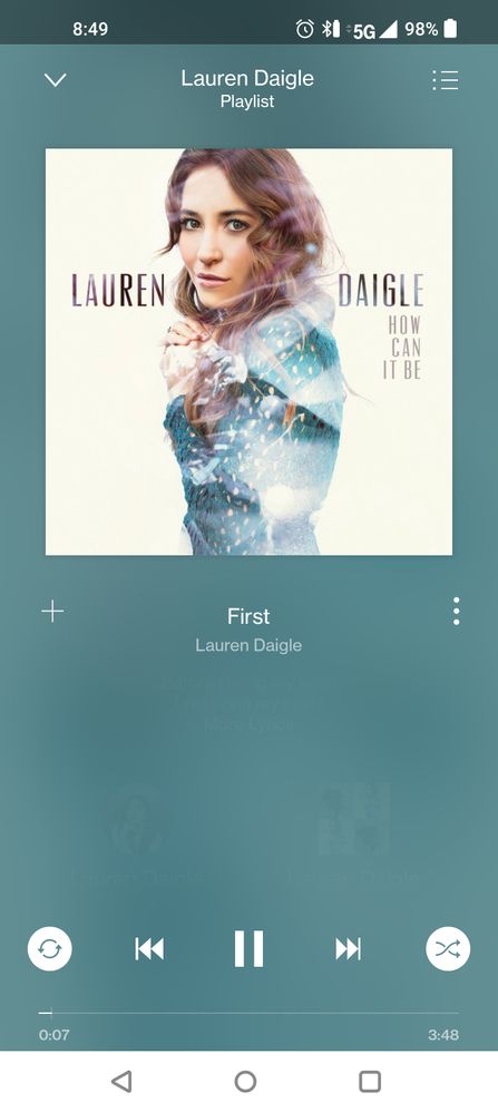 a song I started from the Lauren Daigle playlist at the top of my screen, showing I can play